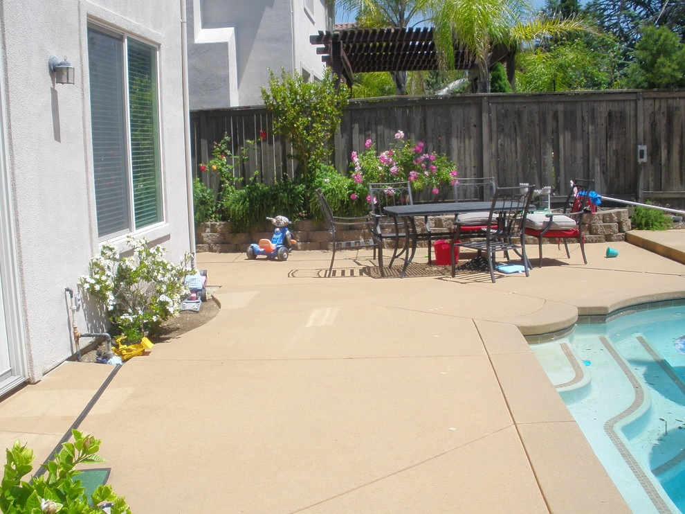 Creating shady seating areas around an existing pool by Bluestar Landscape Designers - Photo 4
