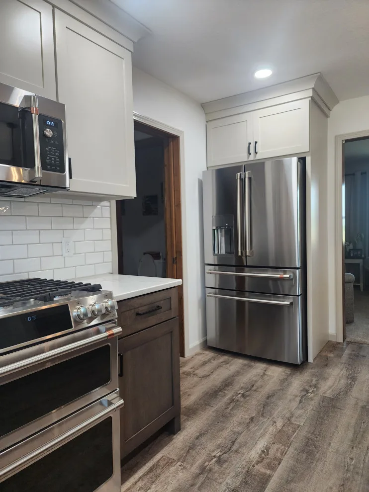 Timeless Dual-Hued Kitchen by Miracle Contracting Inc. - Photo 7