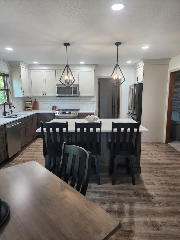 Timeless Dual-Hued Kitchen by Miracle Contracting Inc. - Photo 10