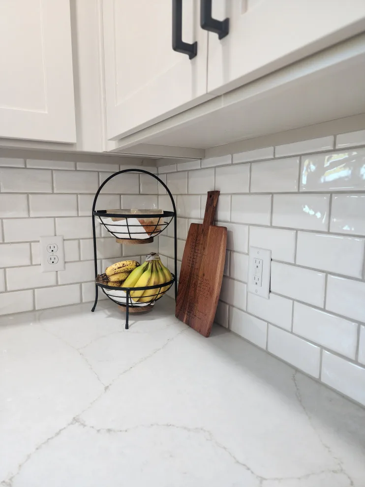 Timeless Dual-Hued Kitchen by Miracle Contracting Inc. - Photo 11