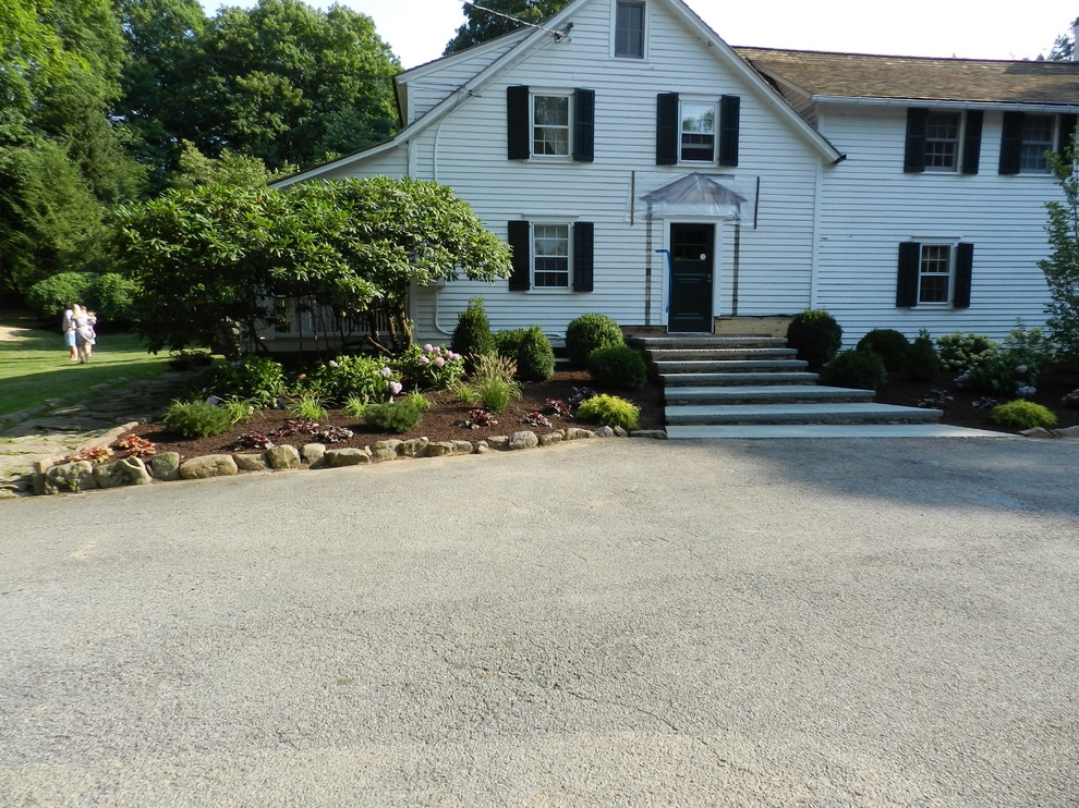 Stone Stairs and Raised Stone Wall Planter by Bolton Landscape Design & Masonry Inc - Photo 10