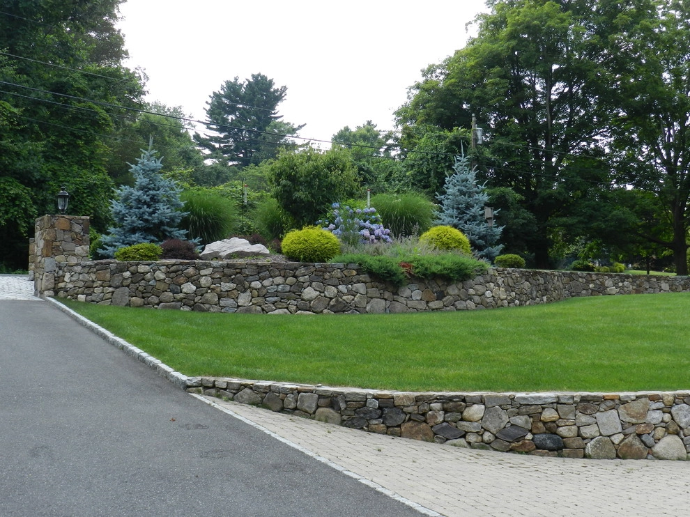 Boulder Retaining Wall & Terraced Landscaping by Bolton Landscape Design & Masonry Inc - Photo 13