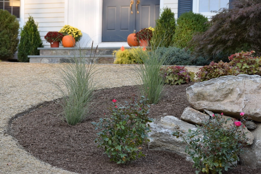 Boulder Retaining Wall & Terraced Landscaping by Bolton Landscape Design & Masonry Inc - Photo 9