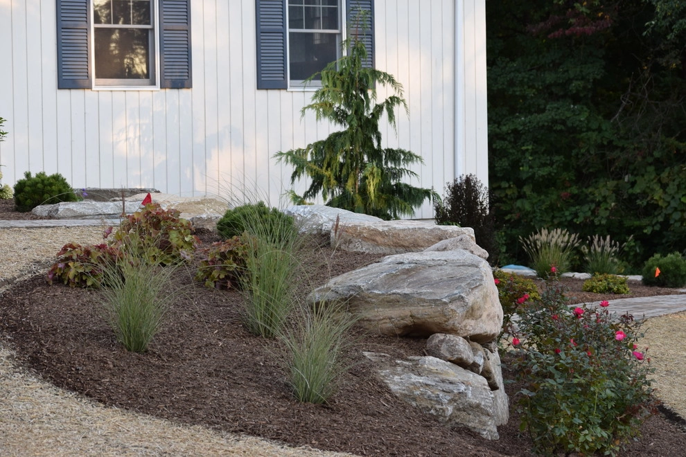 Boulder Retaining Wall & Terraced Landscaping by Bolton Landscape Design & Masonry Inc - Photo 2
