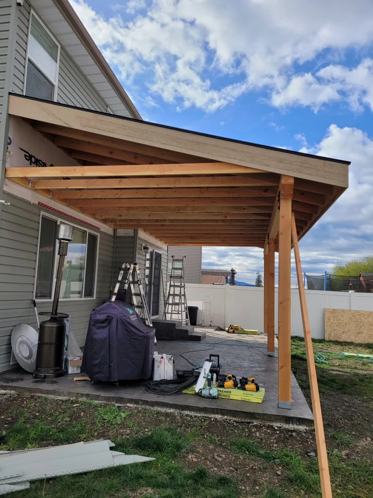 Patio with Concrete Surface and Cover by Northmen Builders - Photo 14