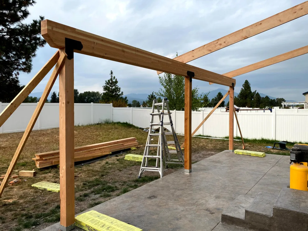 Patio with Concrete Surface and Cover by Northmen Builders - Photo 11
