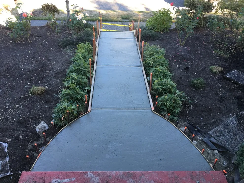 Concrete Stair Removal and Installation by DH Land Pros - Photo 6