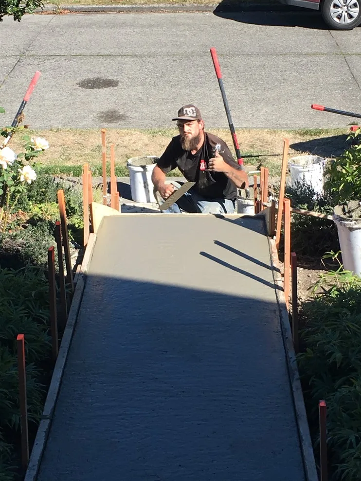 Concrete Stair Removal and Installation by DH Land Pros - Photo 9