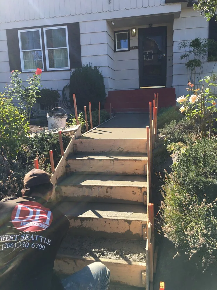 Concrete Stair Removal and Installation by DH Land Pros - Photo 3