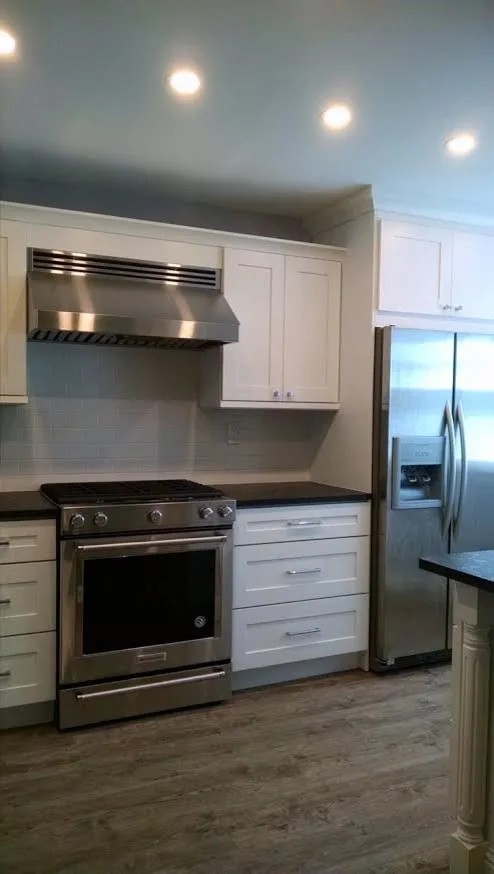 Modern White Kitchen Renovation by A B Graham Contracting - Photo 11