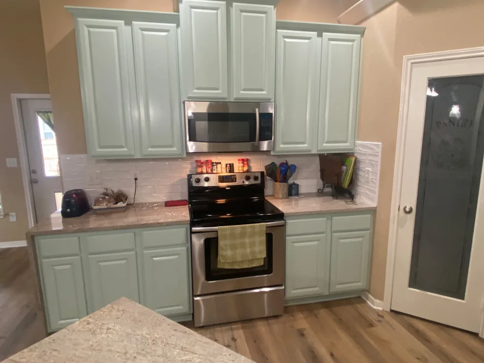 Custer Cabinet Refinish, Backsplash Installation, Granite Countertops, and Flooring by Stillwater Building & Remodeling - Photo 4