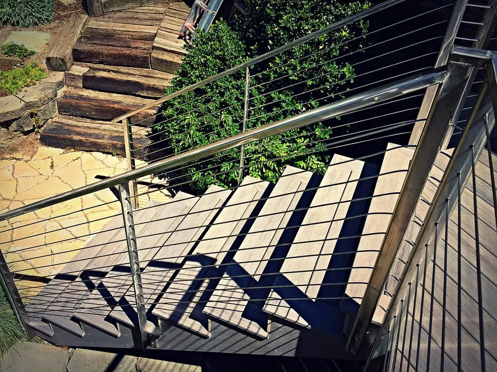 Tailored Deck Construction with Stainless Steel Railings by Icon Construction & Remodeling - Photo 6