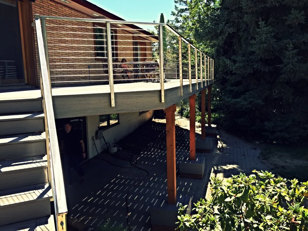 Tailored Deck Construction with Stainless Steel Railings by Icon Construction & Remodeling - Photo 3