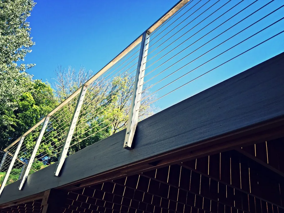 Tailored Deck Construction with Stainless Steel Railings by Icon Construction & Remodeling - Photo 7