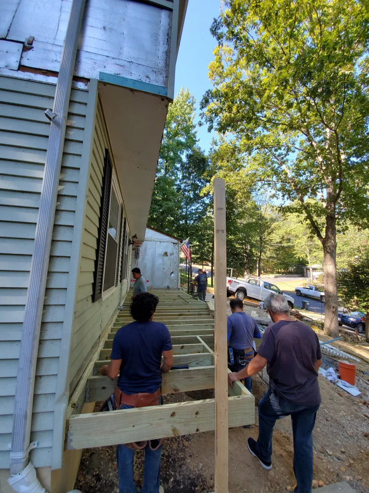 Porch with Breezeway Leading to Basement by Vm Home Improvement LLC - Photo 2