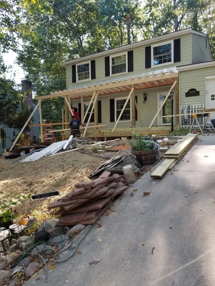 Porch with Breezeway Leading to Basement by Vm Home Improvement LLC - Photo 17