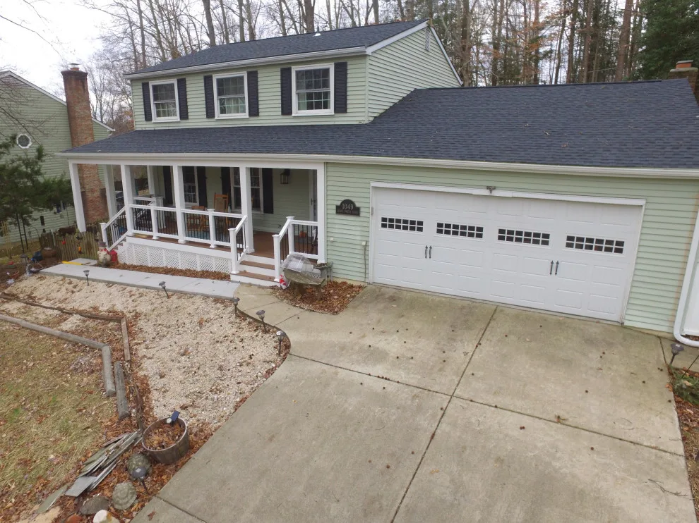 Porch with Breezeway Leading to Basement by Vm Home Improvement LLC - Photo 4