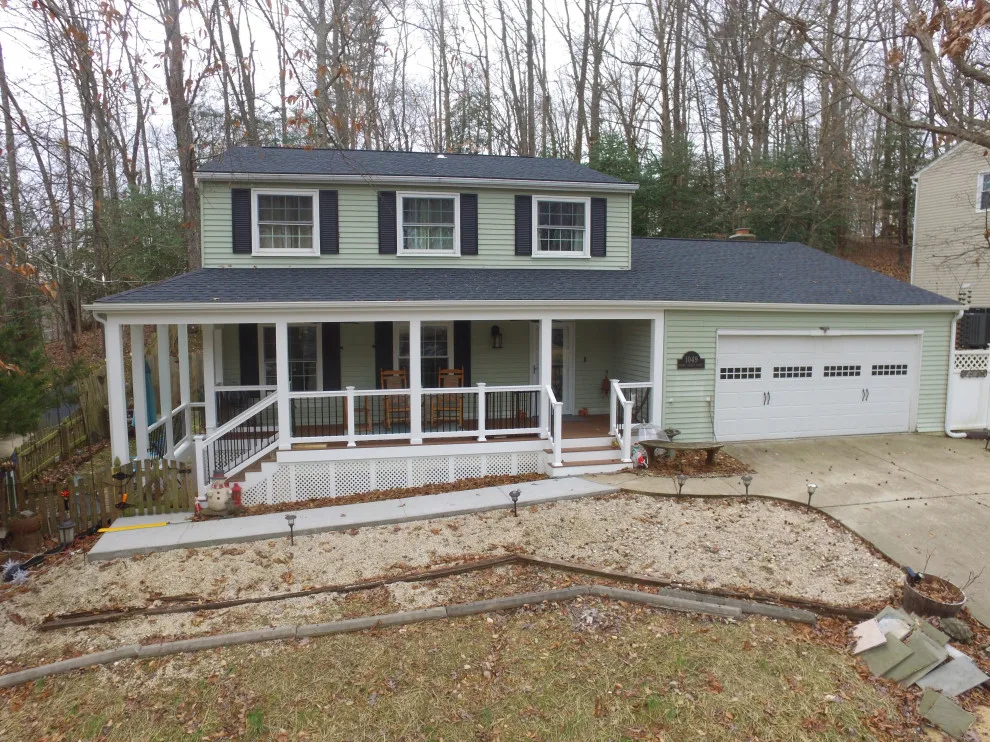 Porch with Breezeway Leading to Basement by Vm Home Improvement LLC - Photo 10