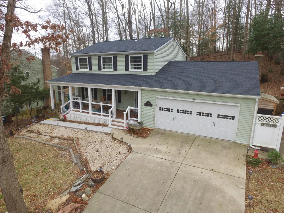 Porch with Breezeway Leading to Basement by Vm Home Improvement LLC - Photo 16