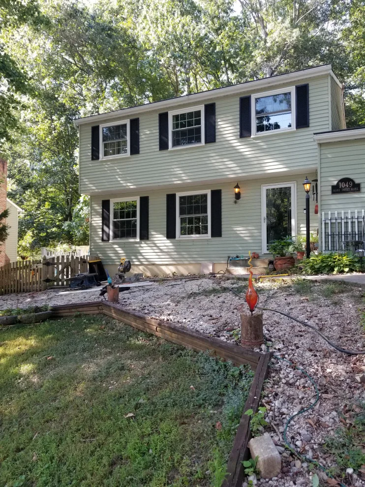 Porch with Breezeway Leading to Basement by Vm Home Improvement LLC - Photo 13