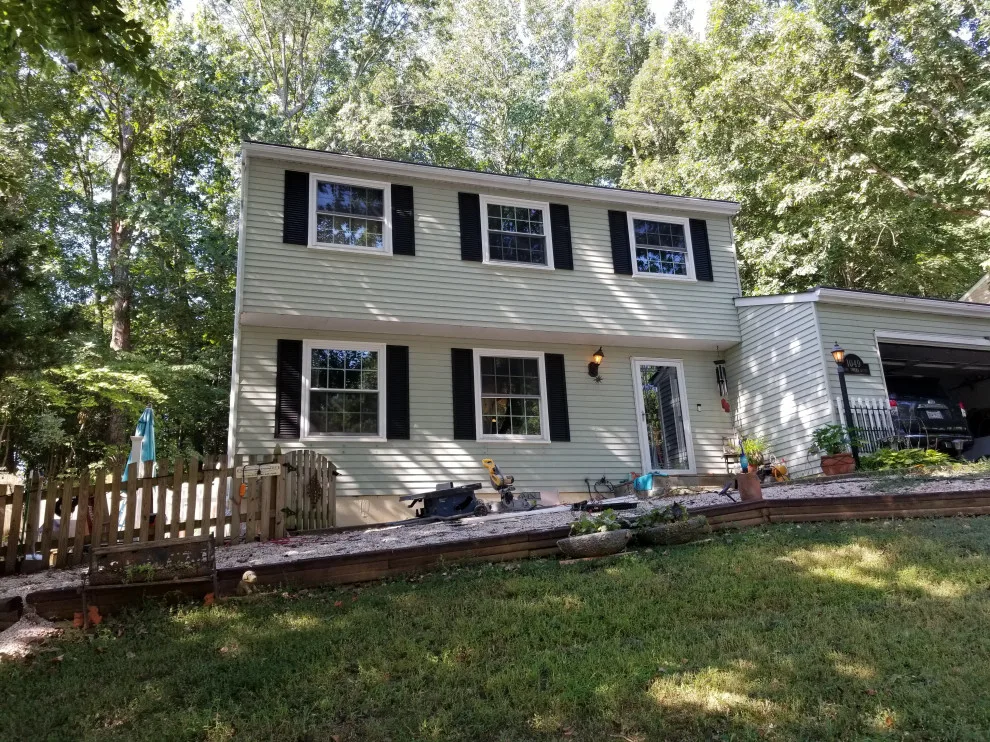 Porch with Breezeway Leading to Basement by Vm Home Improvement LLC - Photo 18