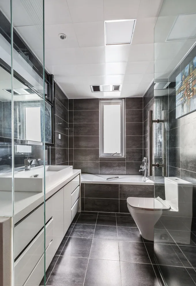 Ashen Restrooms by Kitchen Master Design & Remodeling LLC - Photo 18