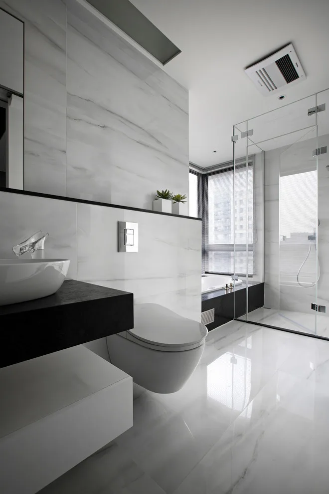 Ashen Restrooms by Kitchen Master Design & Remodeling LLC - Photo 8