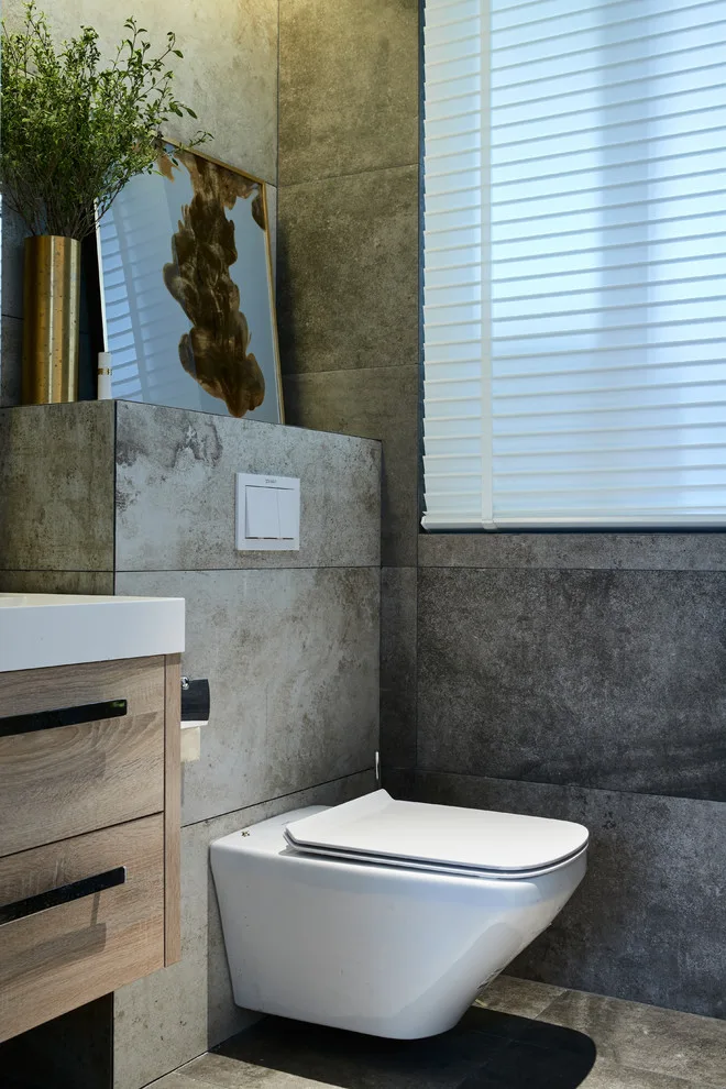 Ashen Restrooms by Kitchen Master Design & Remodeling LLC - Photo 3