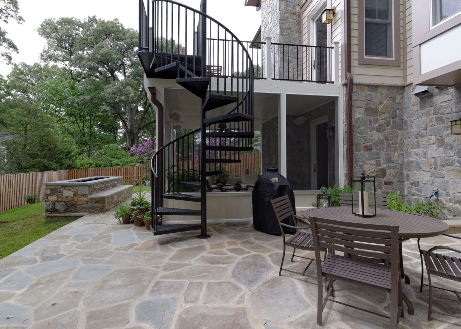 Flagstone Patio and deck with spiral staircase by Classic Stonescaping & Gardens - Photo 3