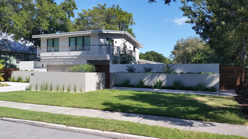 Hudson Bayou Mid-Century Renovation by BORDEN Landscape Design - Photo 5