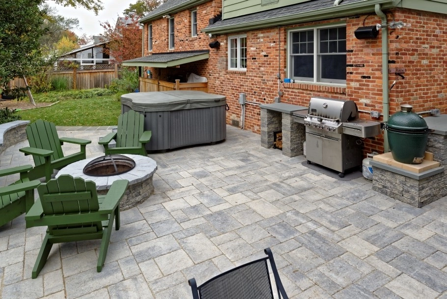 Large Backyard Patio and outdoor kitchen by Classic Stonescaping & Gardens - Photo 2
