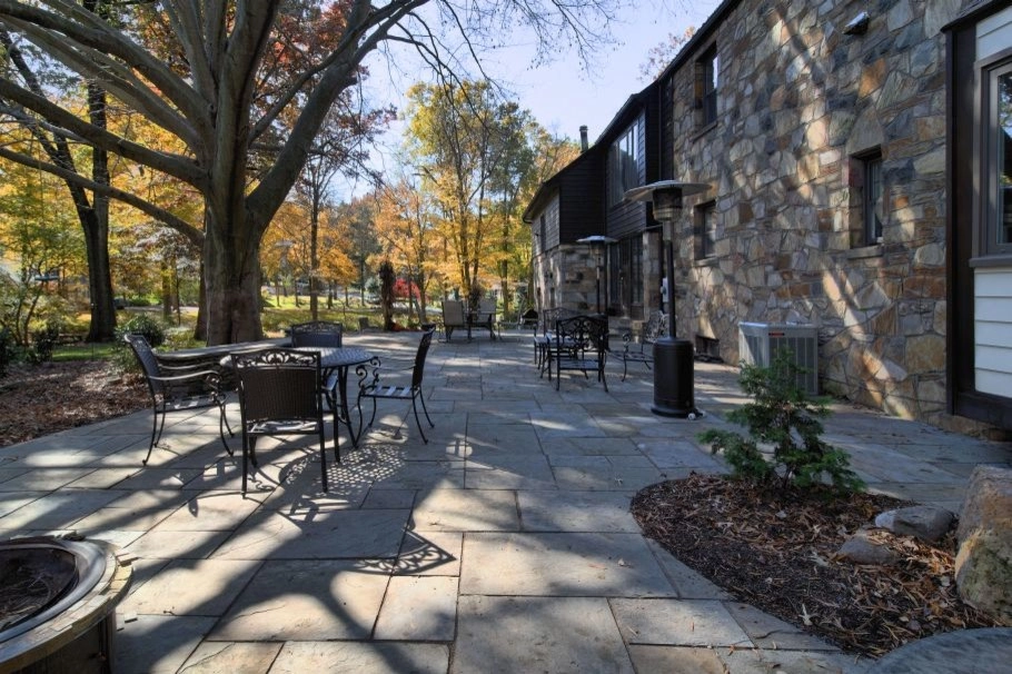 Large Backyard Patio by Classic Stonescaping & Gardens - Photo 5