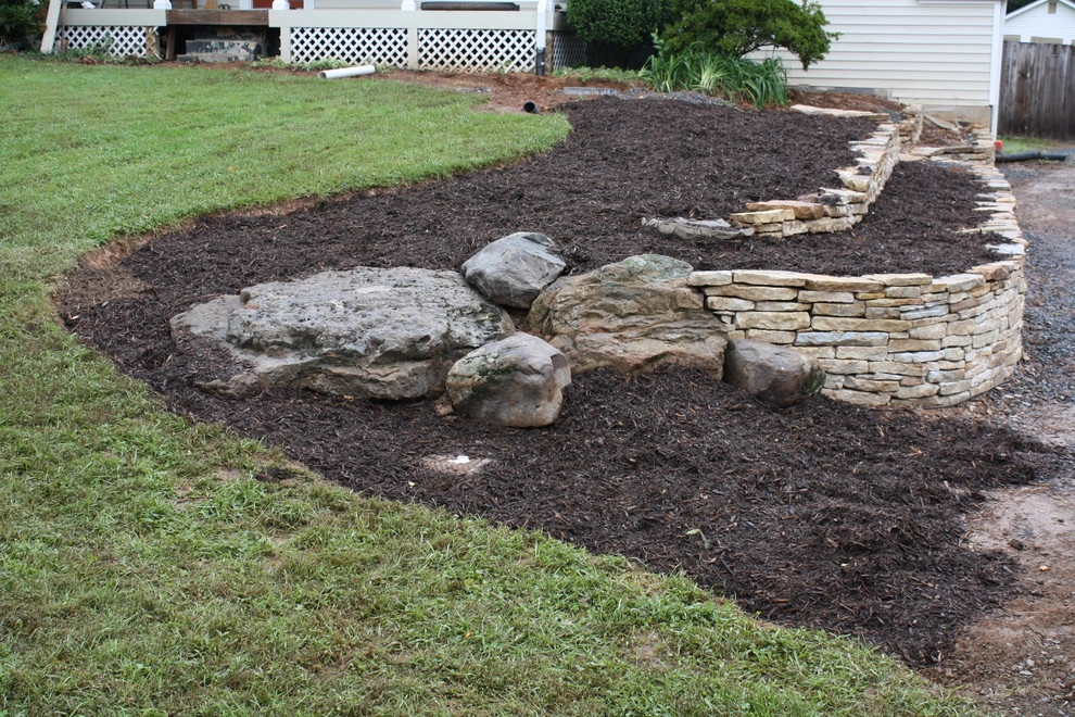 Before and after yard transformation by Classic Stonescaping & Gardens - Photo 3