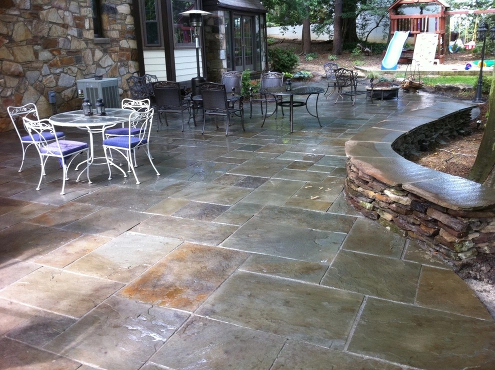 Large Backyard Patio by Classic Stonescaping & Gardens - Photo 3
