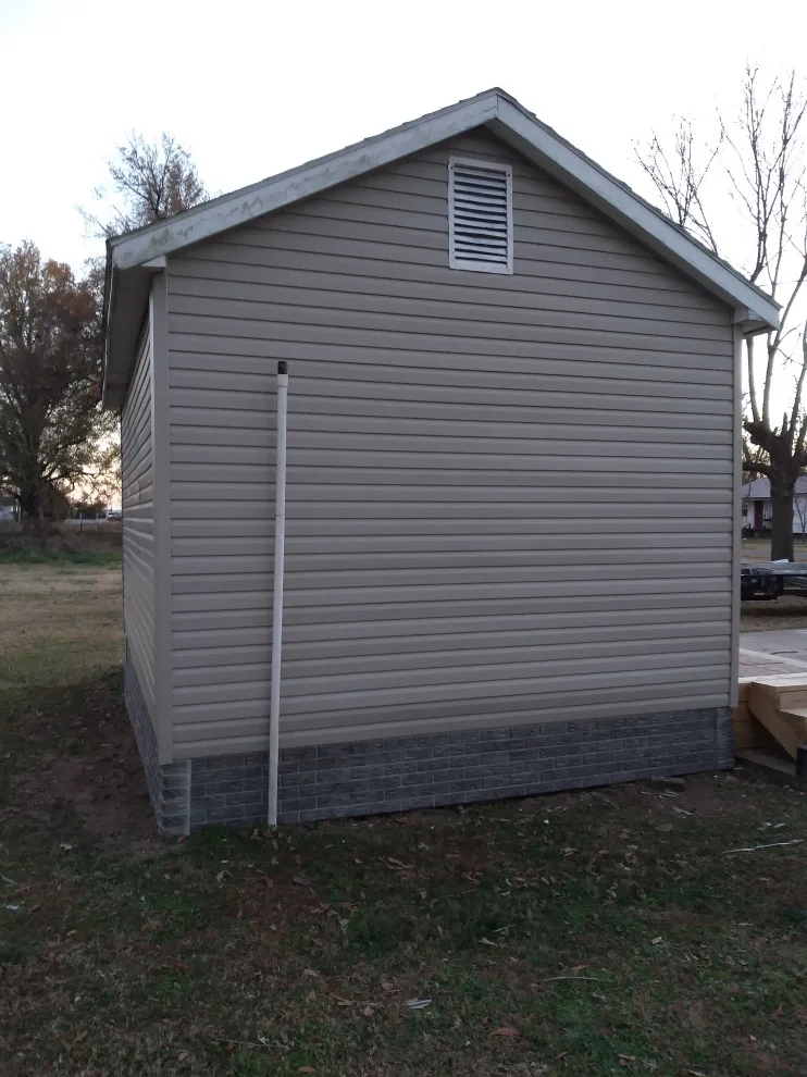 Vinyl Siding Installation by Higgs Homes - Photo 4