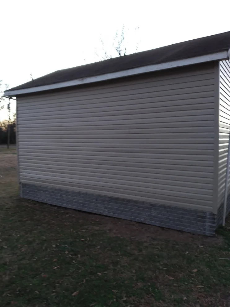 Vinyl Siding Installation by Higgs Homes - Photo 5