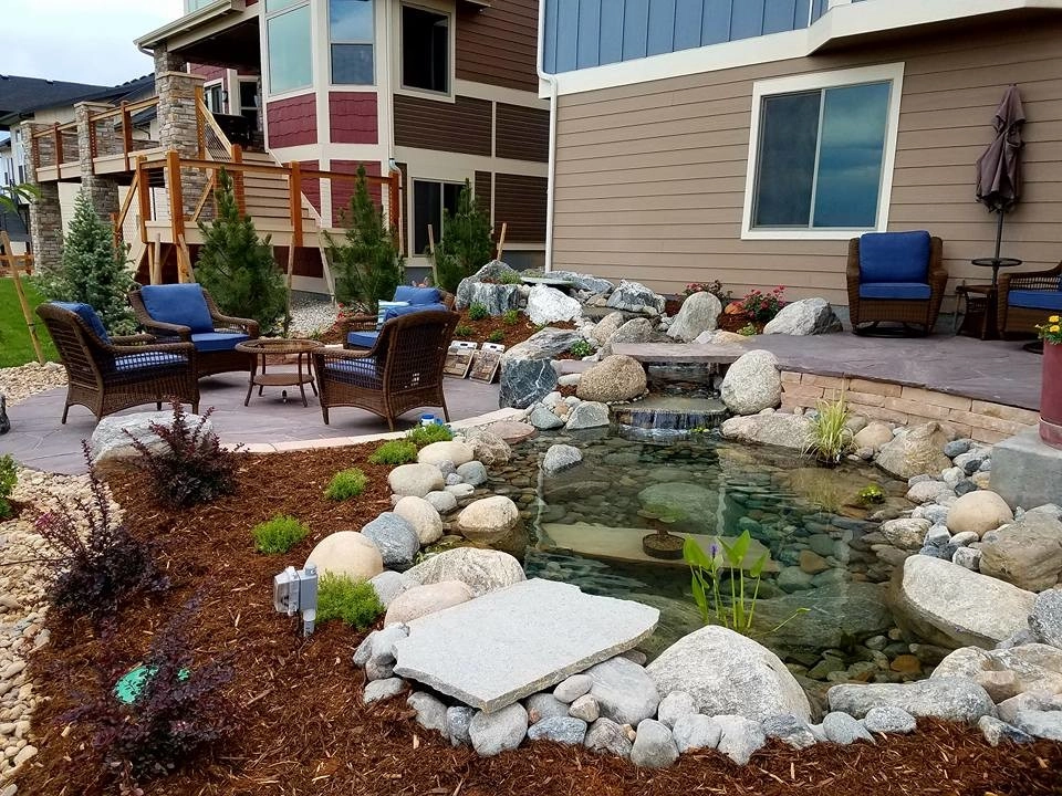 Johnstown New Construction Backyard with Pond and Patio by Colorado Vista Landscape Design, Inc. - Photo 4