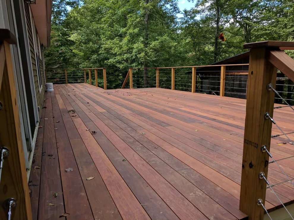 Ipe decking with stainless steel cable railings by A.M.Carter Construction Inc - Photo 2