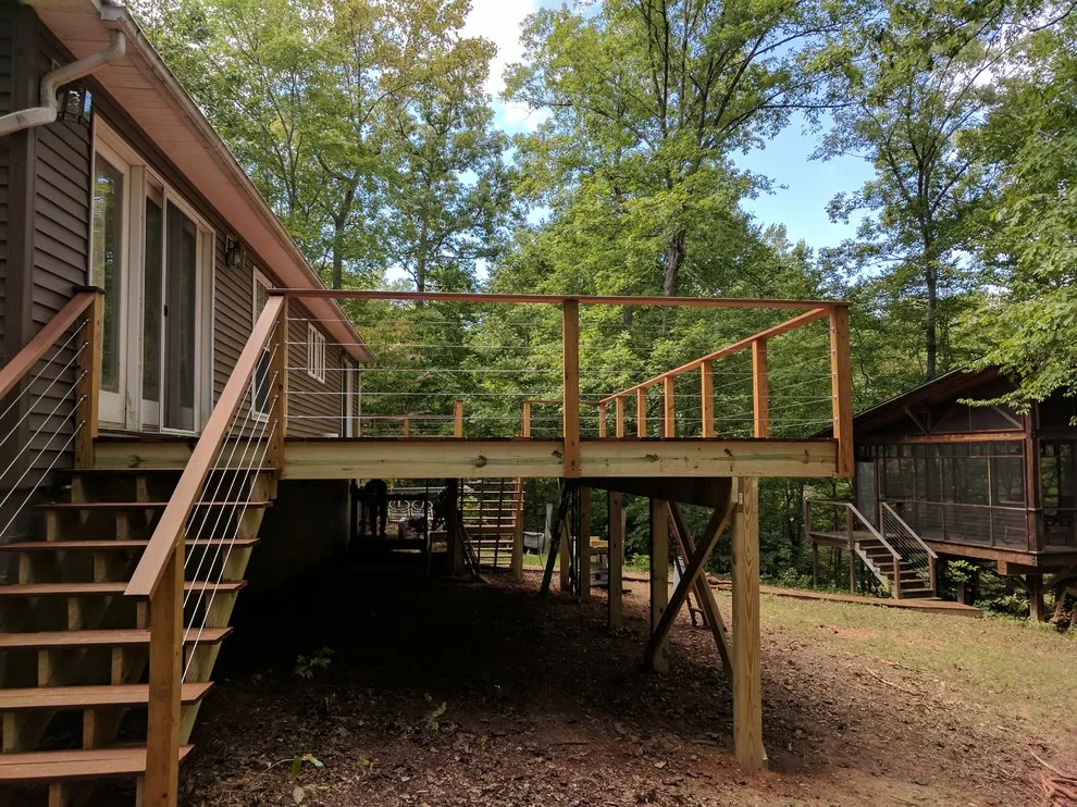 Ipe decking with stainless steel cable railings by A.M.Carter Construction Inc - Photo 5