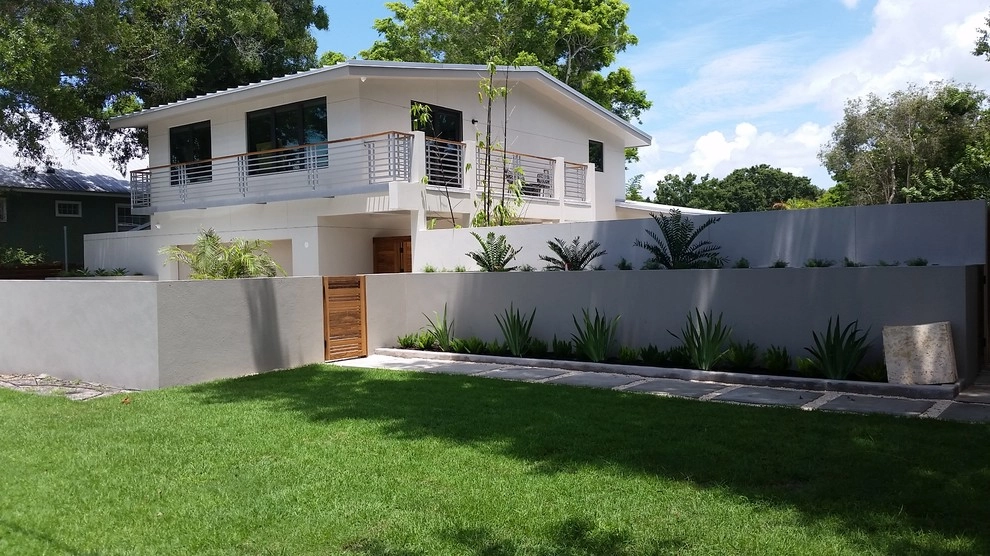 Hudson Bayou Mid-Century Renovation by BORDEN Landscape Design - Photo 3