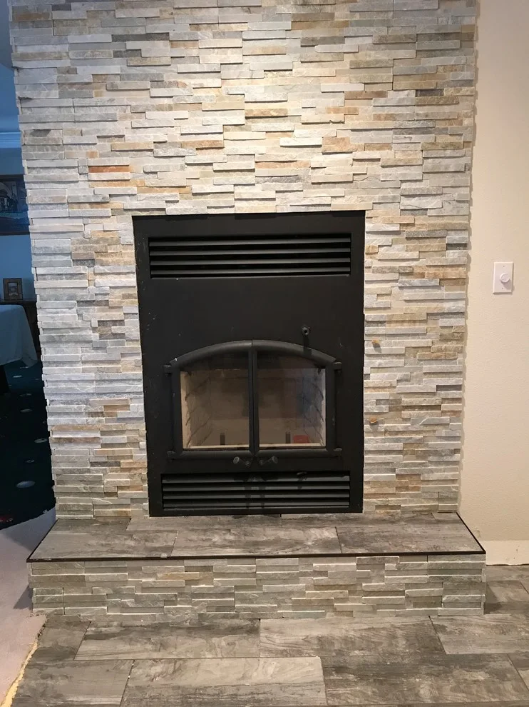 Layered stone fireplace by Mel's Carpet Outlet - Photo 2