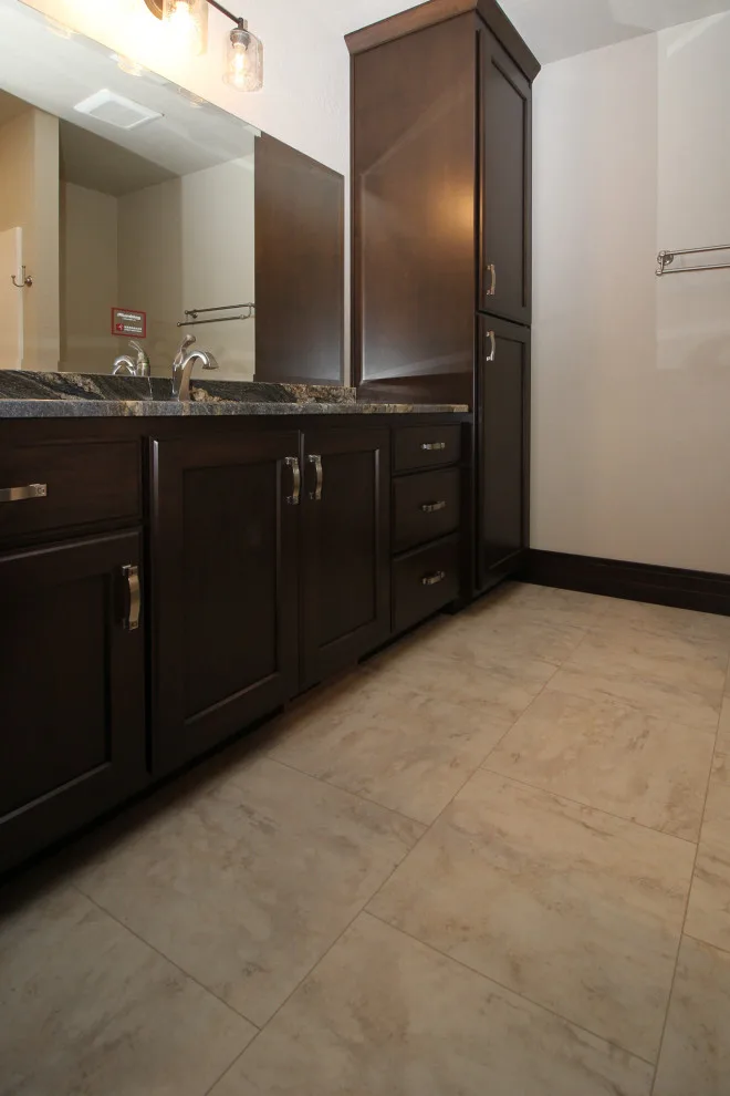 Cozy Home Featuring Marble Countertops and Tiled Shower by H.J. Martin And Son - Photo 6