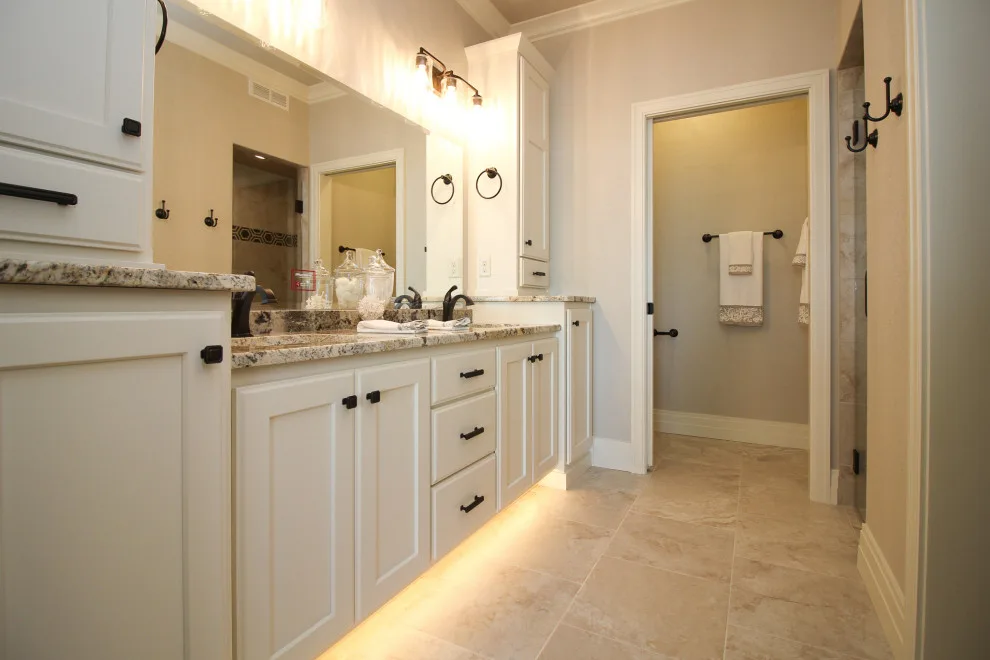 Cozy Home Featuring Marble Countertops and Tiled Shower by H.J. Martin And Son - Photo 3