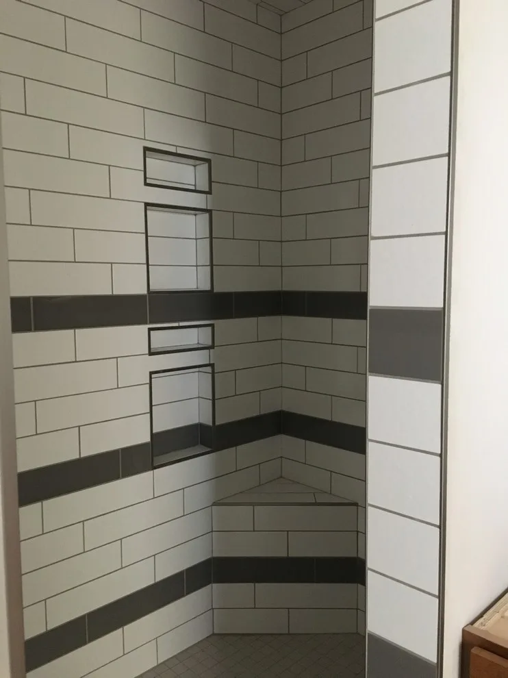 subway tile shower in white by Mel's Carpet Outlet - Photo 2