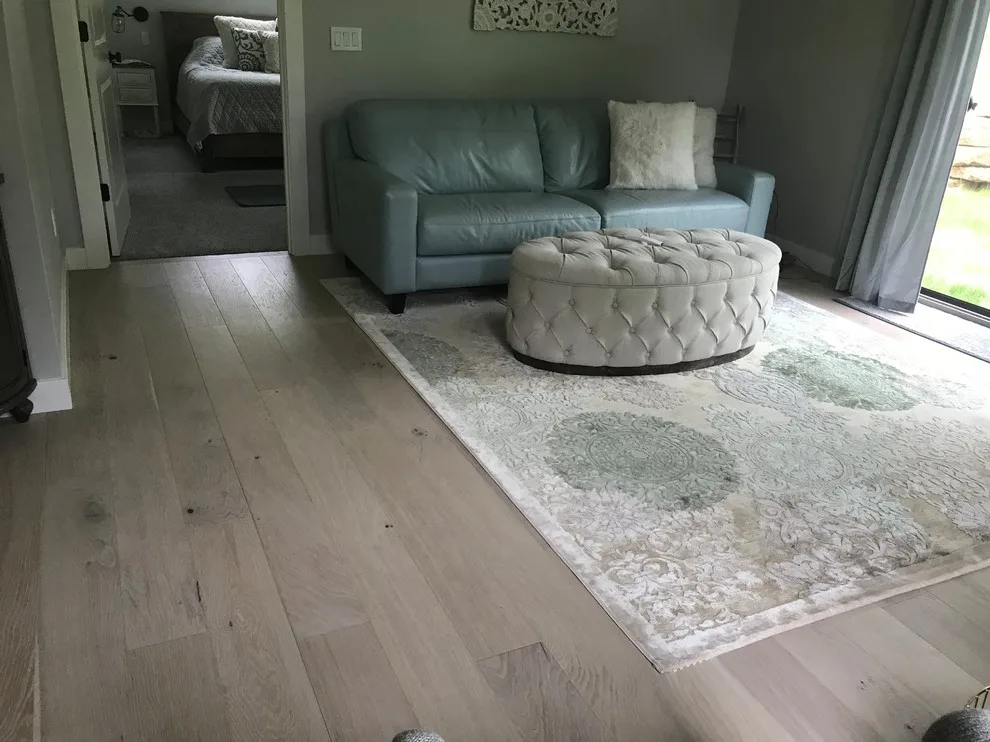 lightened wood flooring by Mel's Carpet Outlet - Photo 2