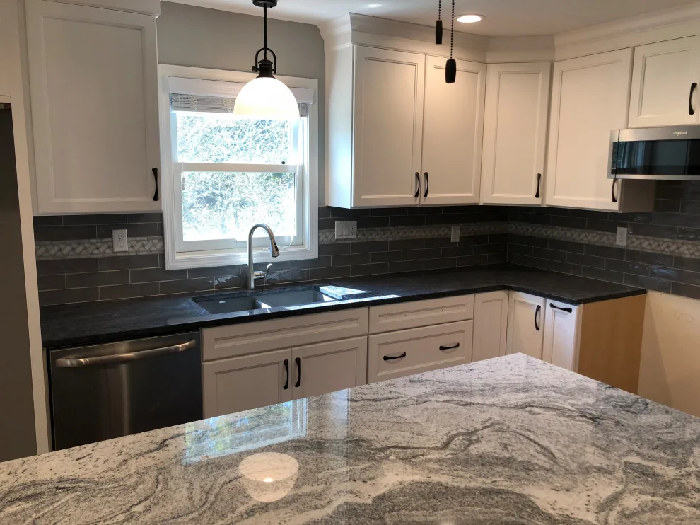 updated kitchen cabinetry and backsplash by Spencer Remodeling - Photo 5