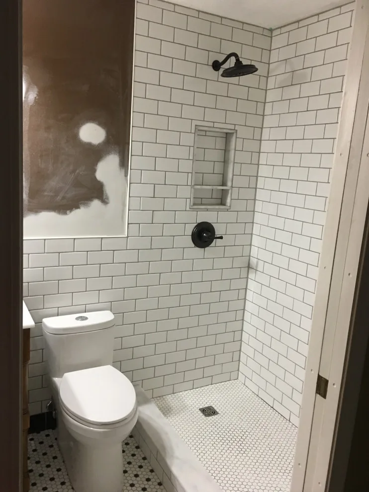 vintage tile design for modern master bathroom by Spencer Remodeling - Photo 9