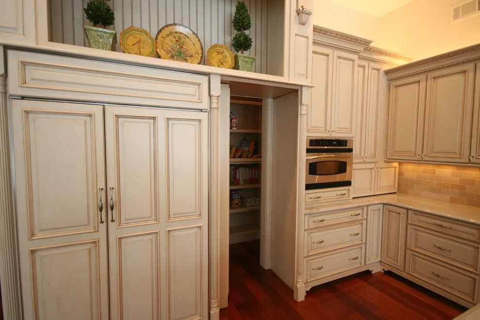 Timeless Charm with Concealed Pantry by Walters Cabinets, Inc. - Photo 5