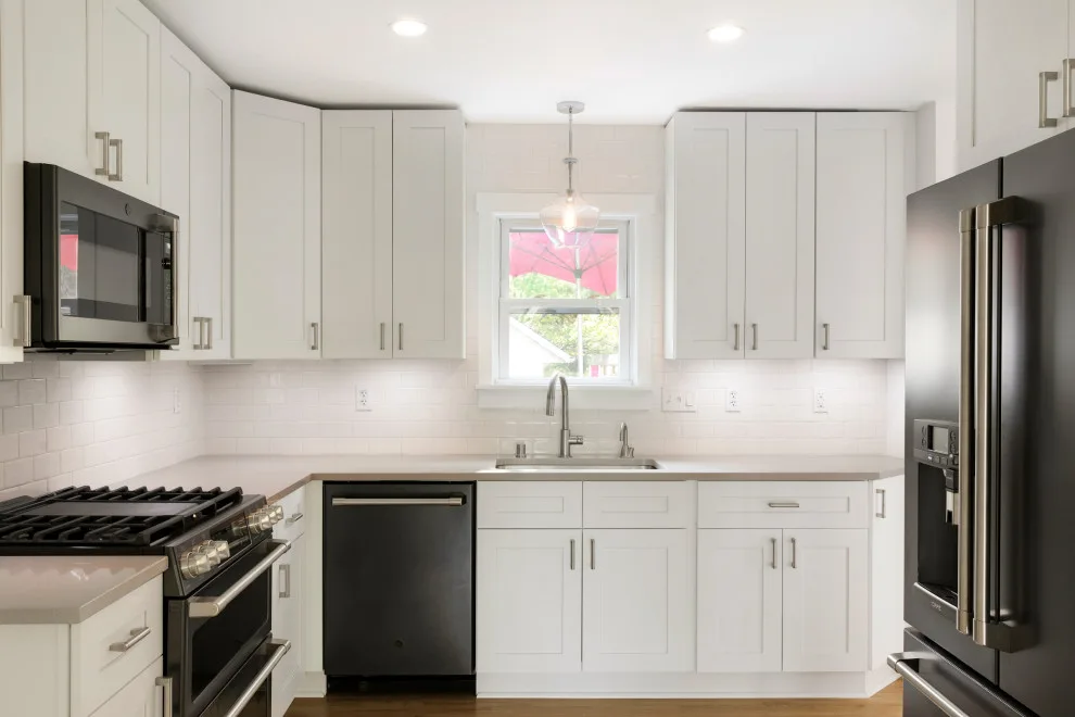 Kitchen with Pink Doors by Prima Construction - Photo 4