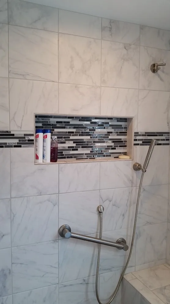 Plainfield Bathroom Renovation II by DreamMaker Bath & Kitchen Of Greater Grand Rapids - Photo 11